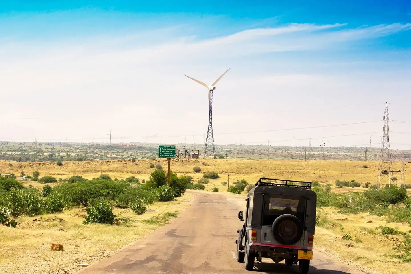 Jaipur to Jaisalmer road trip highway showing long desert road and open Rajasthan landscape.